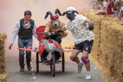 BIDEFORD, DEVON, ENGLAND - JUNE 18 2023: Unstable vehicle participant in the annual Soapbox Derby fun race event. Team in fancy dress.