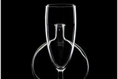 Glass and bottle, glassware still life in monochrome.